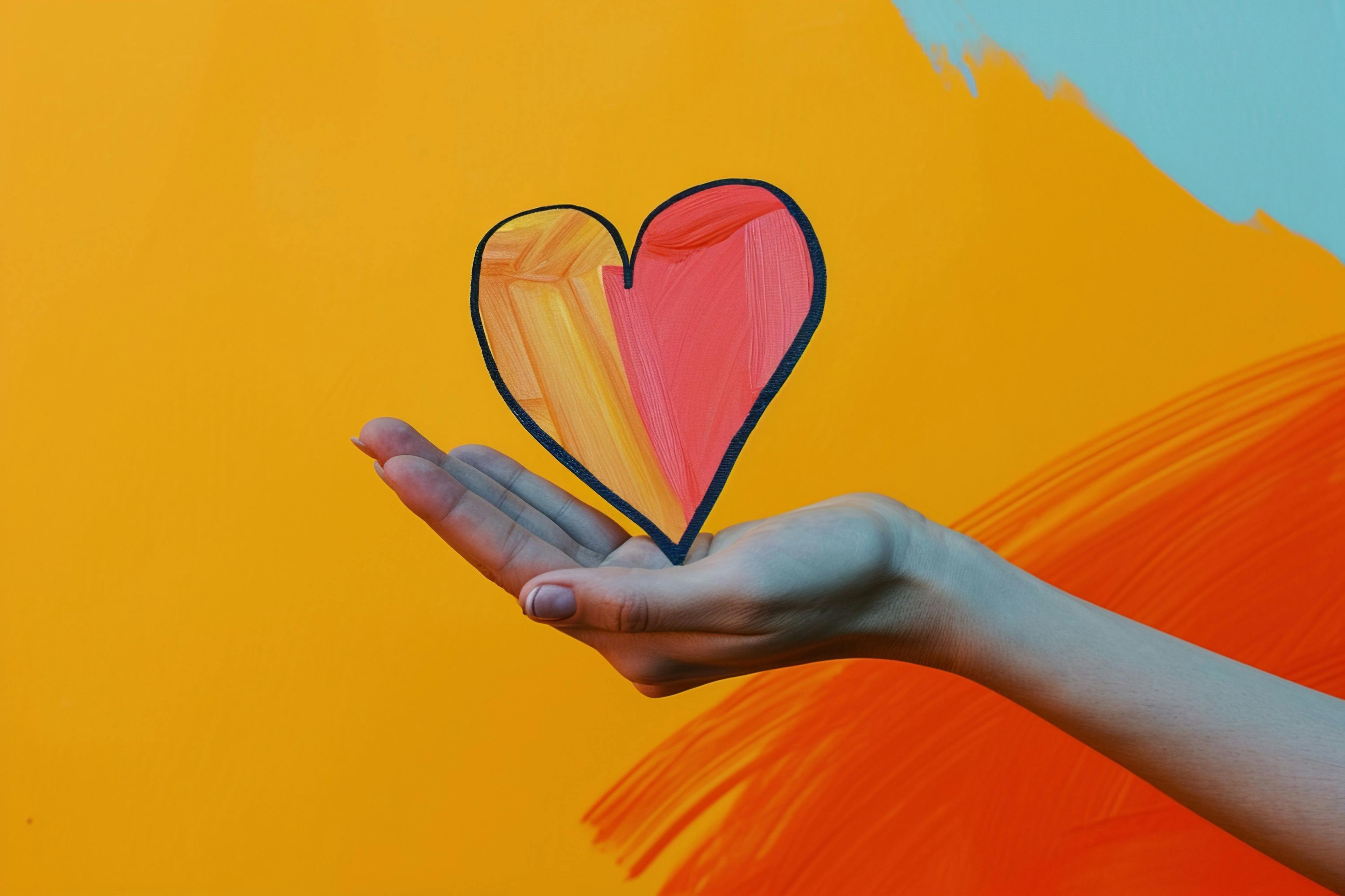 Self-Care Symbolized: Hand Holding Colorful Heart | Image credit: © Kristian - © stock.adobe.com 
